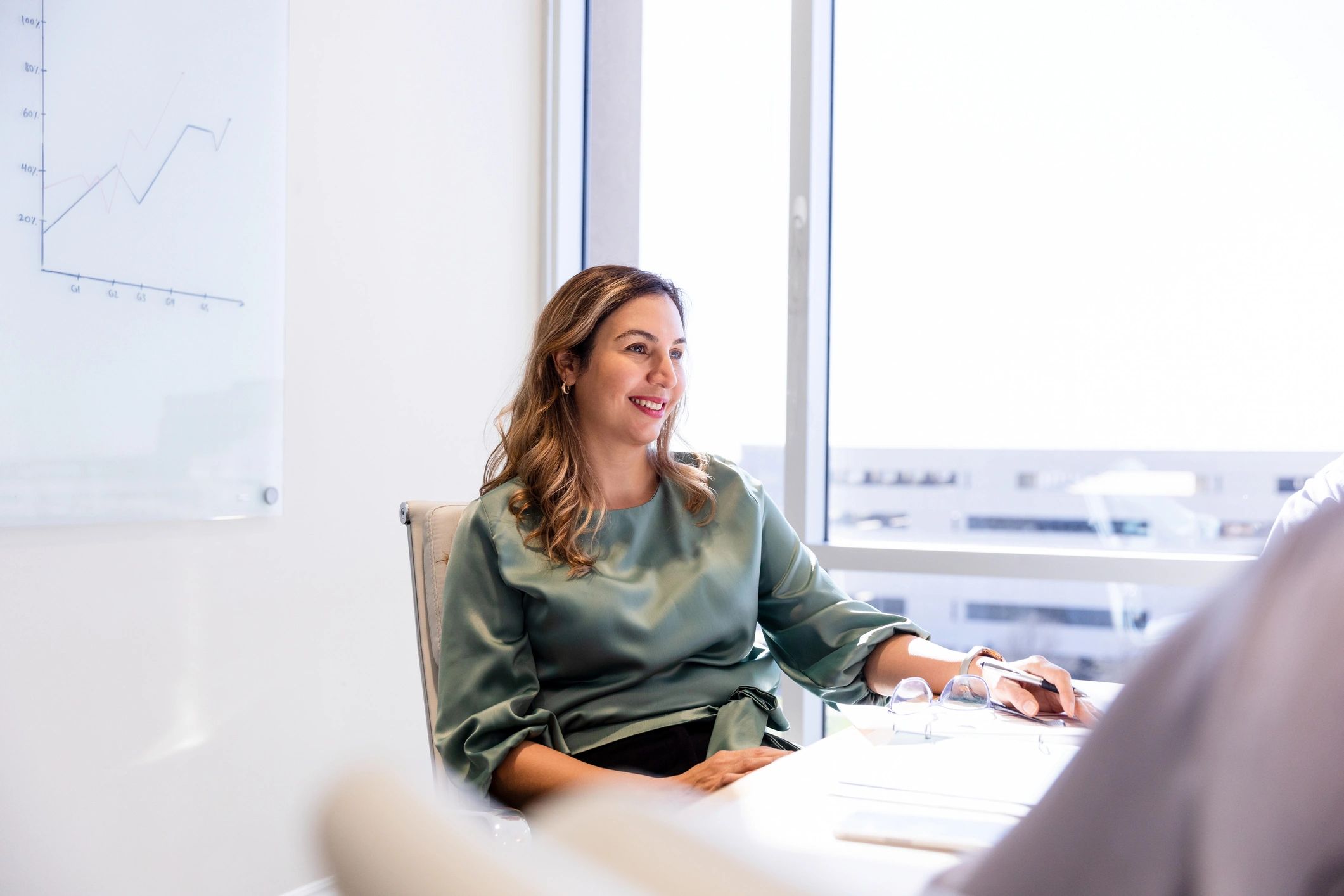 Small business owner collaborating with colleagues