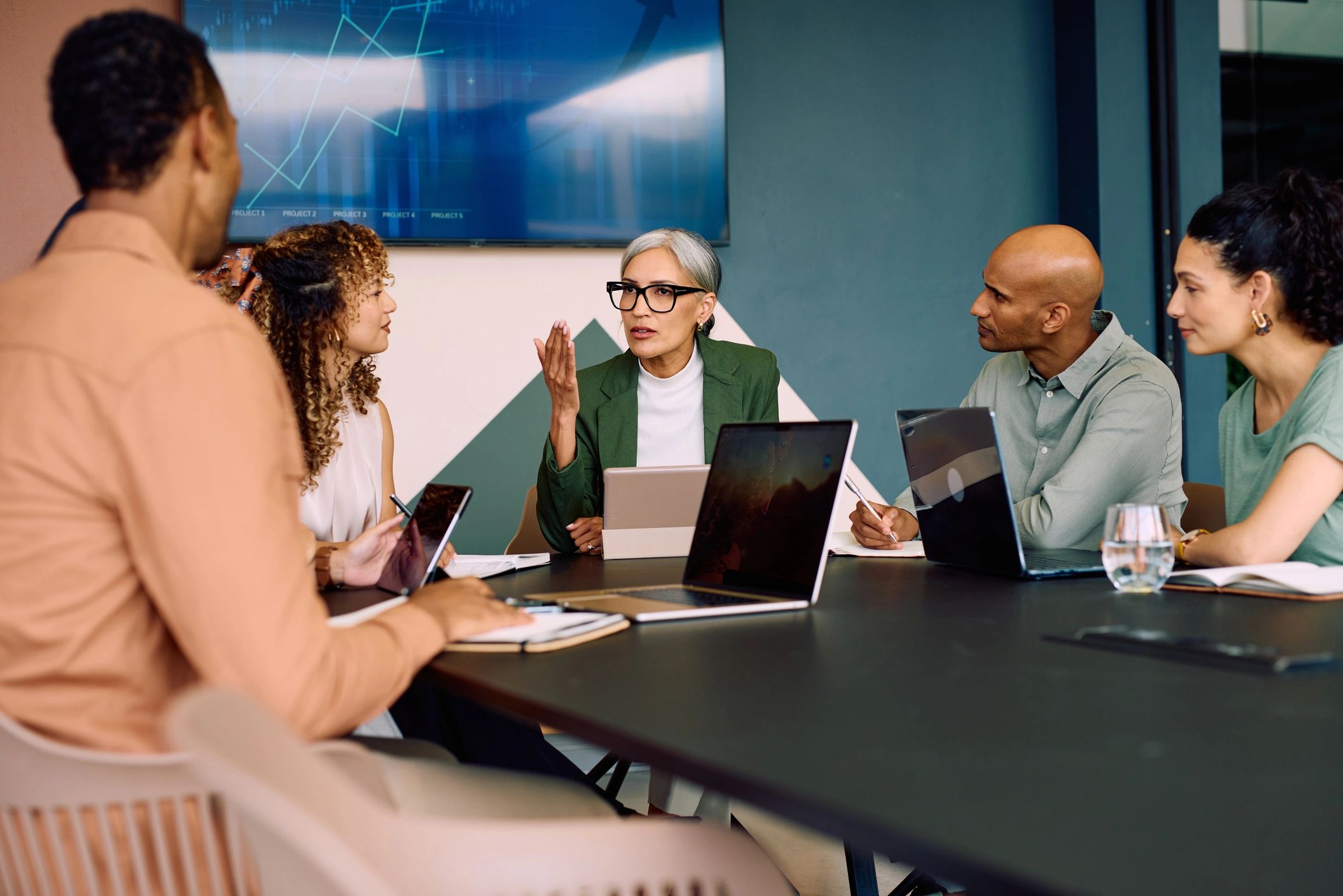 Team collaborating around a technology-enabled business workflow
